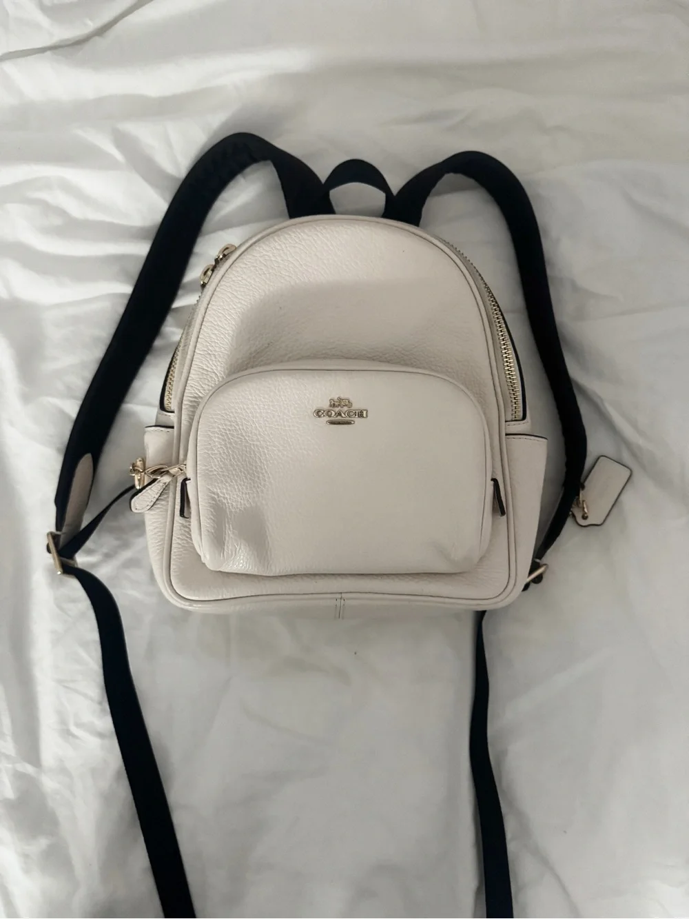 Coach Pebble Leather Mini Backpack in Cream with Black Straps